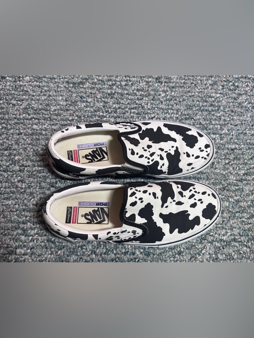 Vans Unisex Slip-On Sneakers in Black and White Cow Print - Picture 2 of 11